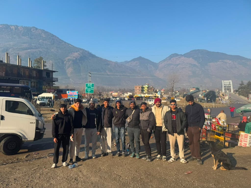 Custom private group trip travellers on a mountain road expedition